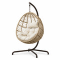 Sillón colgante de rattan sintético y acero con cojines de poliéster beige